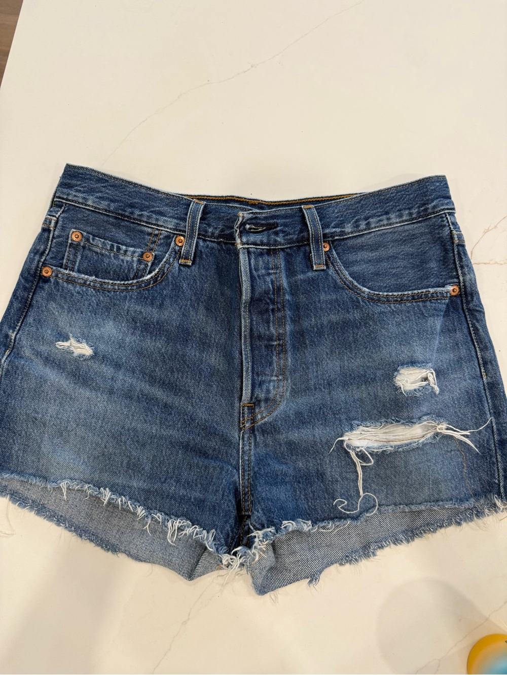 Levi's Medium Blue Distressed Denim Cutoff Shorts